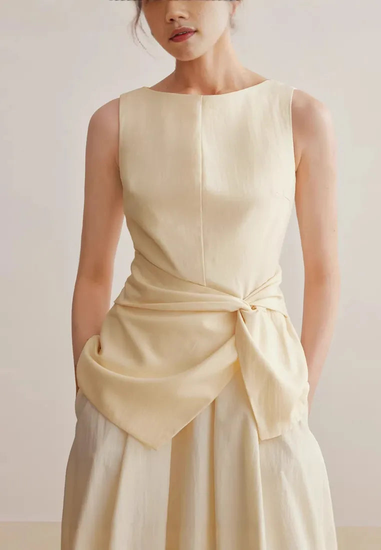 Conjunto top tirantes nudo y falda midi burbuja cintura alta minimalista