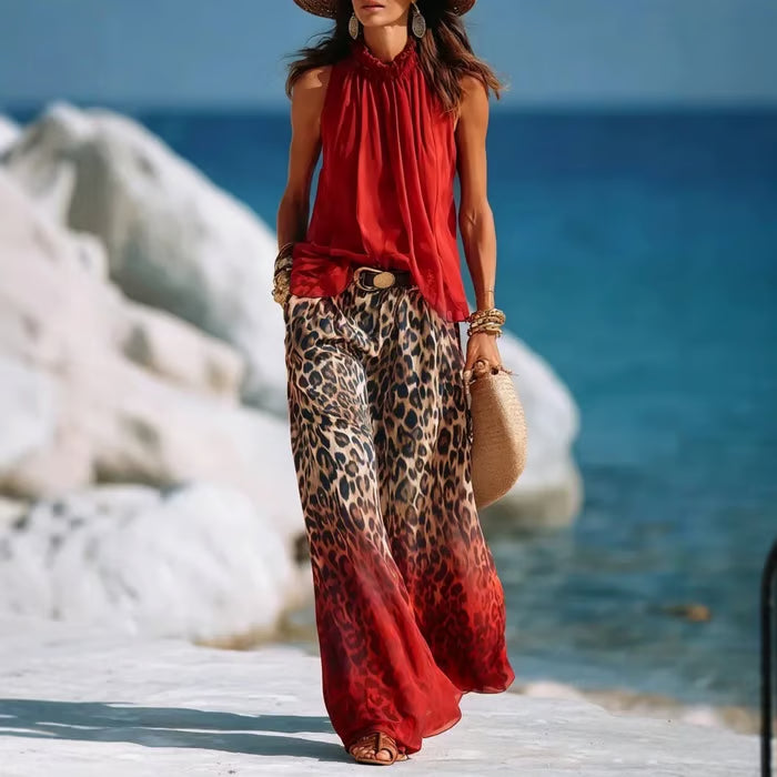CONJUNTO RESORT CON TOP CUELLO ALTO DE VOLANTES Y ESTAMPADO LEOPARDO