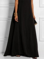 Vestido maxi suelto sin mangas cuello redondo calado uniones divididas color sólido