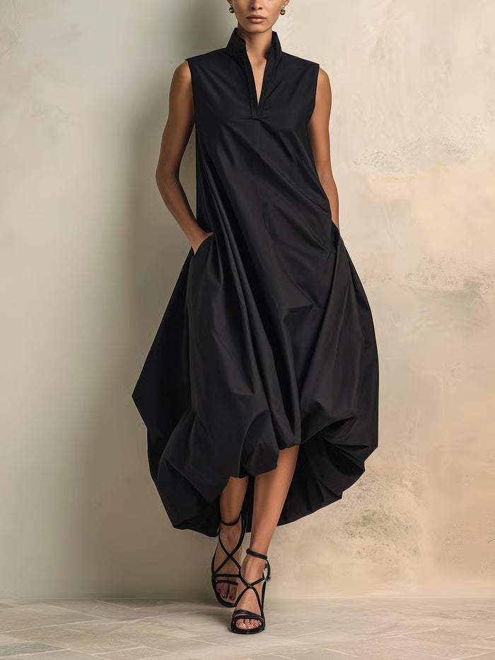 VESTIDO MIDI NEGRO SIN MANGAS CUELLO ALTO CON BAJO ABULLONADO