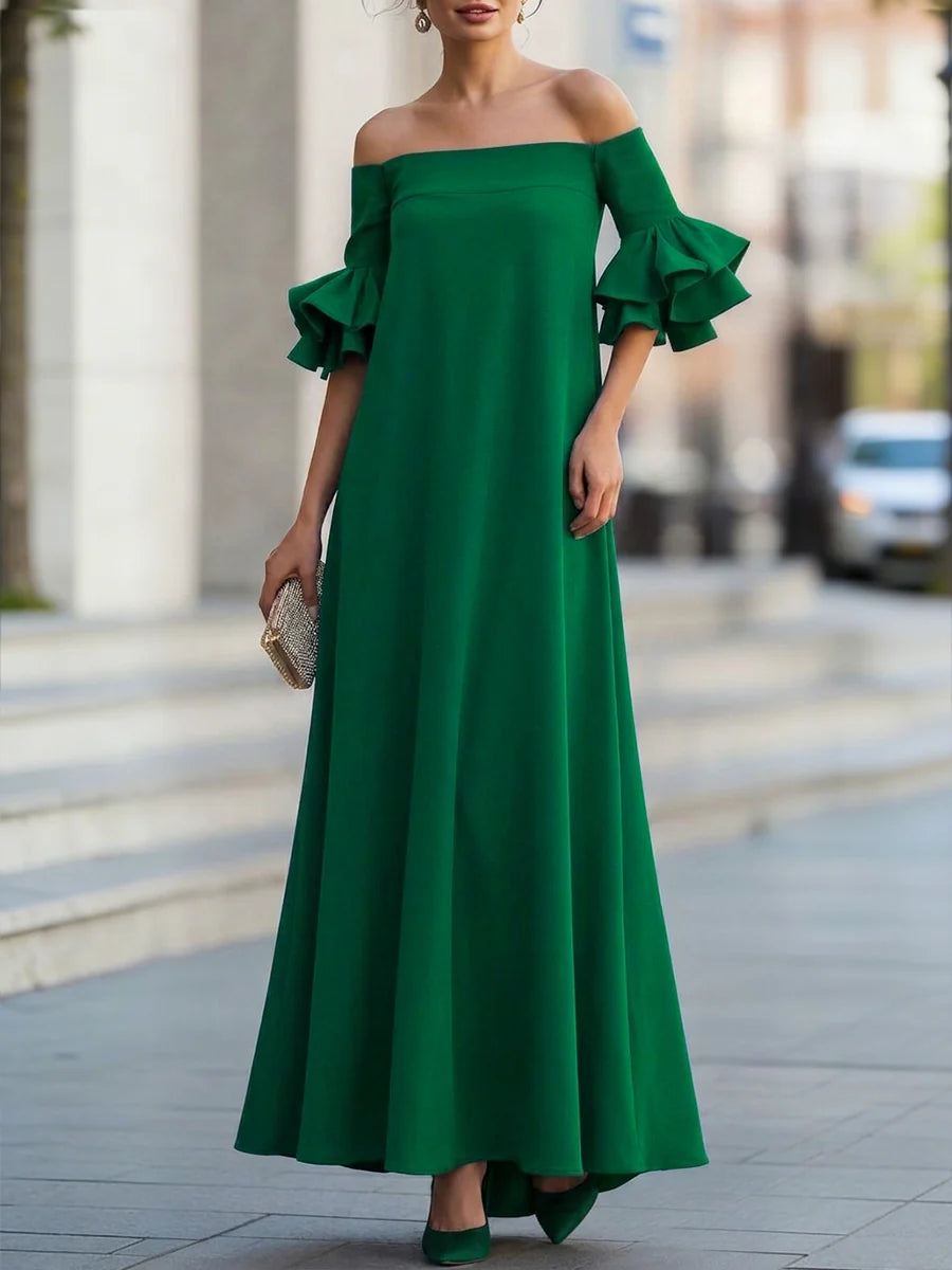 Vestido maxi suelto hombros descubiertos media manga volantes color sólido