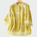 Camisa bordada floral con botones para mujer