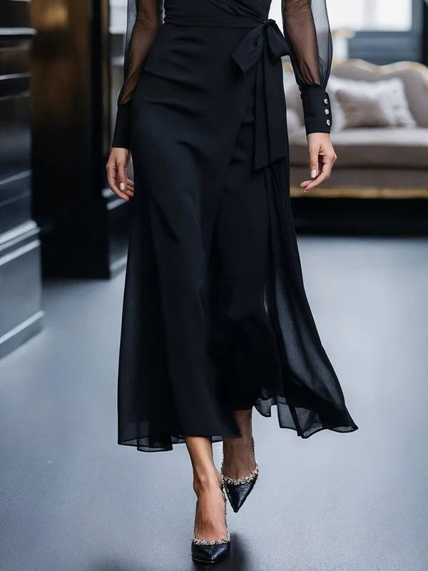 VESTIDO MAXI PLISSADO FOLGADO DE MANGA COMPRIDA COM PALA, CINTURA AJUSTÁVEL E BOTÕES
