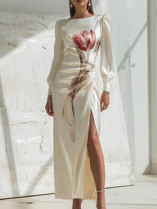 VESTIDO MAXI COM MANGAS COMPRIDAS E ESTAMPADO FLORAL, PLISSADO E ABERTURA LATERAL - DECOTE REDONDO