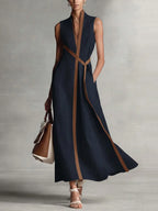Vestido maxi suelto sin mangas cuello redondo bolsillos color contrastante