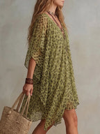 Vestido corto manga murciélago leopardo asimétrico volantes escote en v transparente