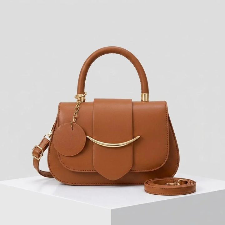 Compact Handbag with Structured Flap and Elegant Metallic Detail