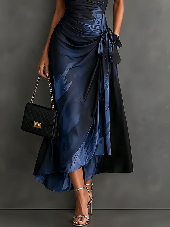 VESTIDO CRUZADO CON ESTAMPADO ABSTRACTO, CUELLO SOLAPA, MANGA LARGA Y LAZADA EN CINTURA