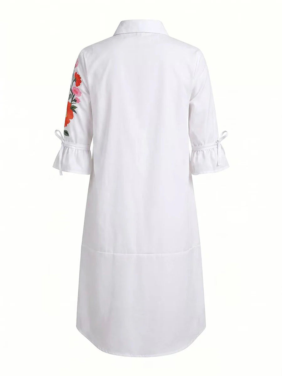 VESTIDO MIDI DE CAMISEIRO CORTE EM A DE MANGA MÉDIA COM BOTÕES, ESTAMPADO FLORAL, BOLSOS E LAÇO