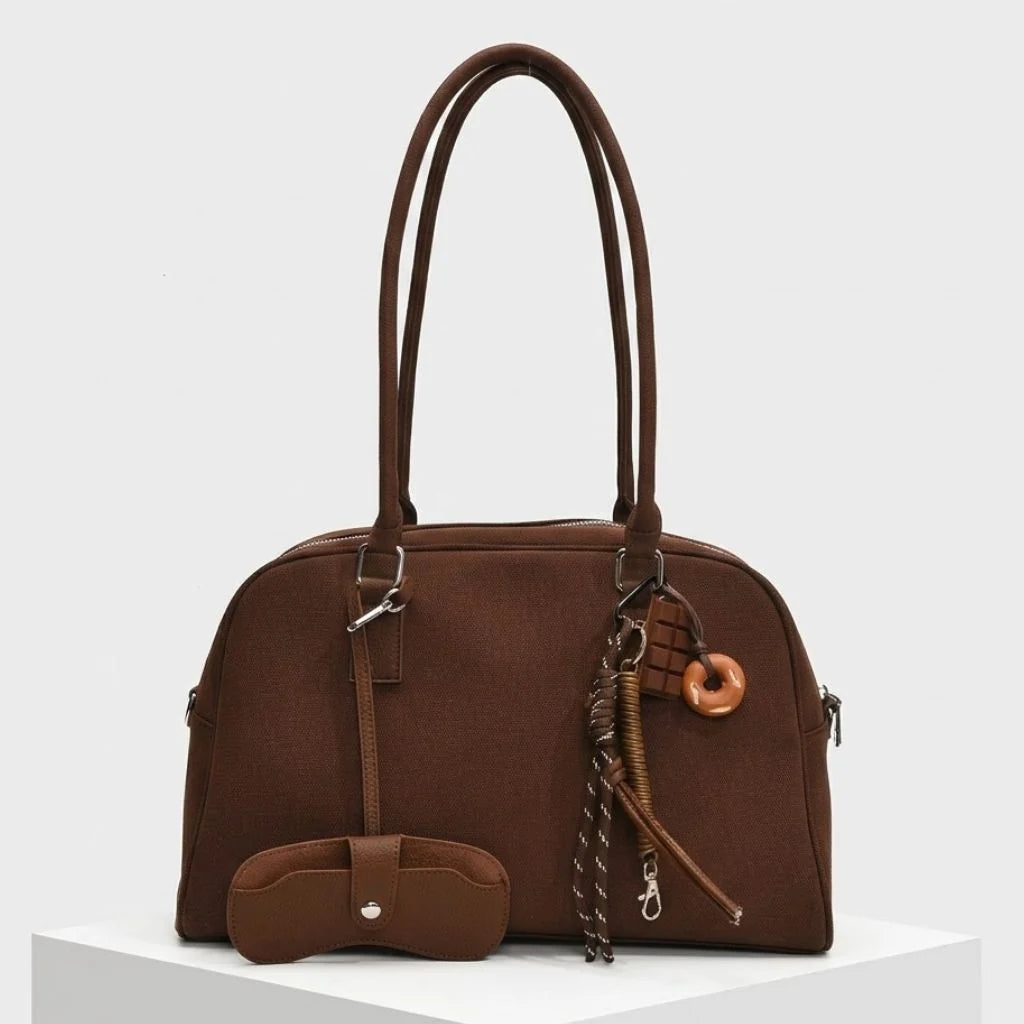 Structured Bowling Bag with Double Handles and Decorative Charms