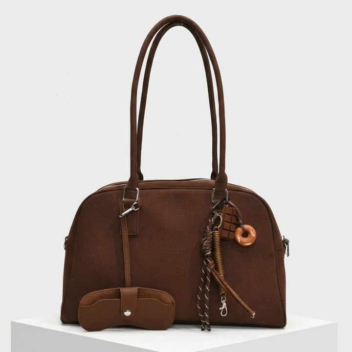 Structured Bowling Bag with Double Handles and Decorative Charms