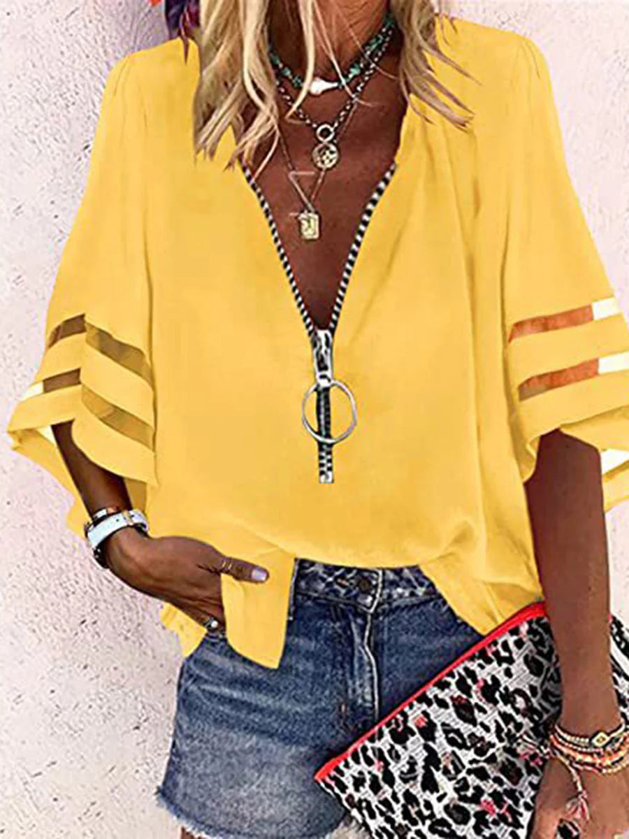 BLUSA FOLGADA DE MANGA TRÊS QUARTOS COM BAINHA, FECHO E GOLA MANDARIM