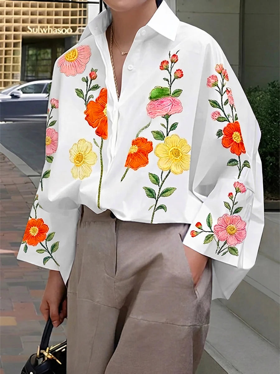 BLUSA FOLGADA DE MANGA COMPRIDA COM BOTÕES, ESTAMPADO FLORAL EM CONTRASTE E SOLAPA