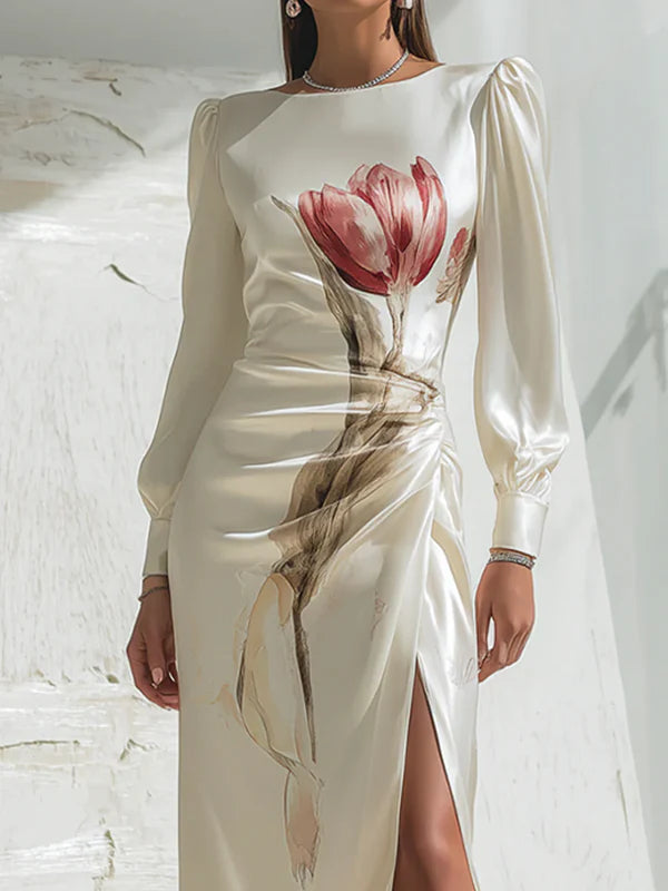 VESTIDO MAXI COM MANGAS COMPRIDAS E ESTAMPADO FLORAL, PLISSADO E ABERTURA LATERAL - DECOTE REDONDO