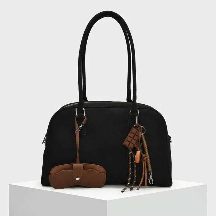 Structured Bowling Bag with Double Handles and Decorative Charms