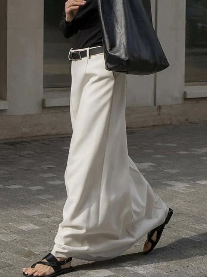 SAIA MIDI ELEGANTE EM COR LISA COM CORTE EM H