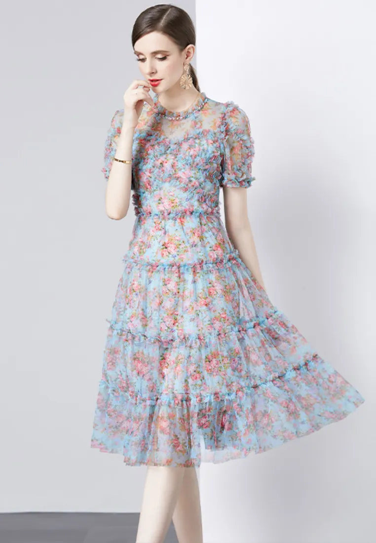 Vestido midi tul floral azul con mangas abullonadas y volantes k26062802