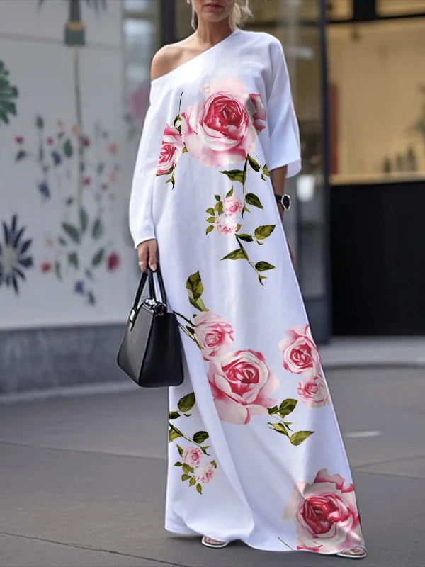 VESTIDO MAXI DE UM OMBRO FLORAL ASSIMÉTRICO COM MANGA TRÊS QUARTOS E BOLSOS