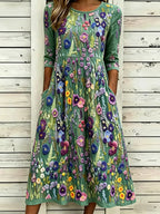Vestido maxi de lino con bordado floral violeta elegante