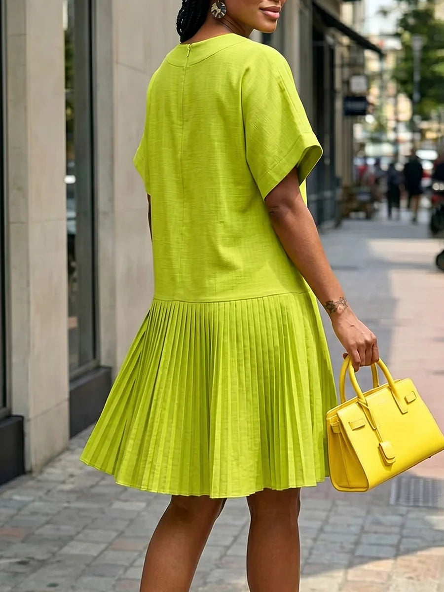 VESTIDO CURTO PLISSADO SOLTO EM ALGODÃO COM GOLA REDONDA E MANGA CURTA