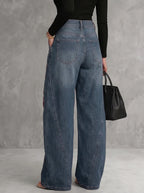 Pantalones vaqueros cintura alta pernera ancha floral abotonado bolsillos calados