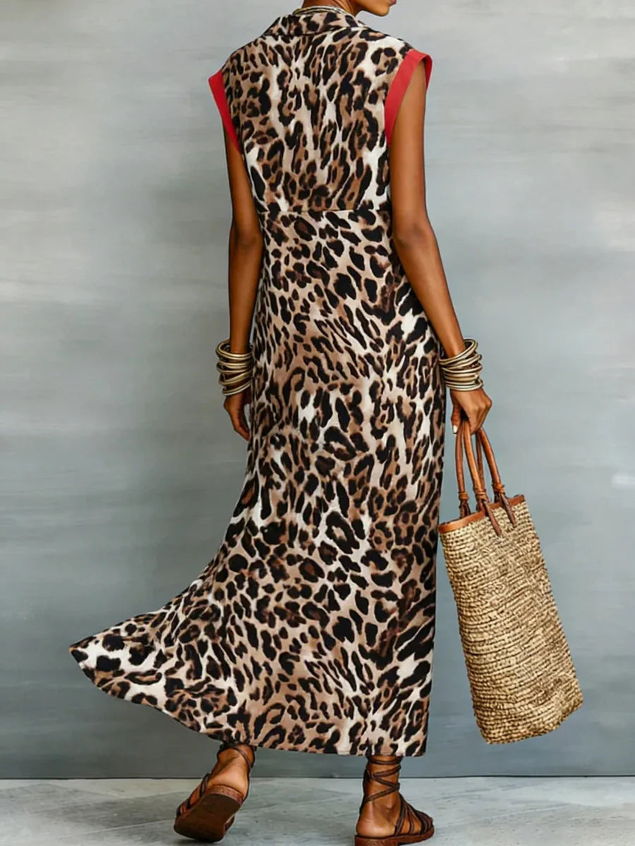 VESTIDO MAXI CAMISEIRO DE CORTE EM A FOLGADO COM BOTÕES, ESTAMPADO LEOPARDO EM CONTRASTE E ABERTURA FRONTAL