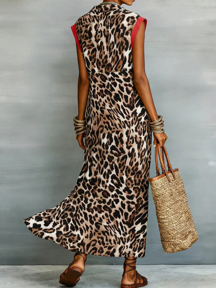 VESTIDO MAXI CAMISEIRO DE CORTE EM A FOLGADO COM BOTÕES, ESTAMPADO LEOPARDO EM CONTRASTE E ABERTURA FRONTAL