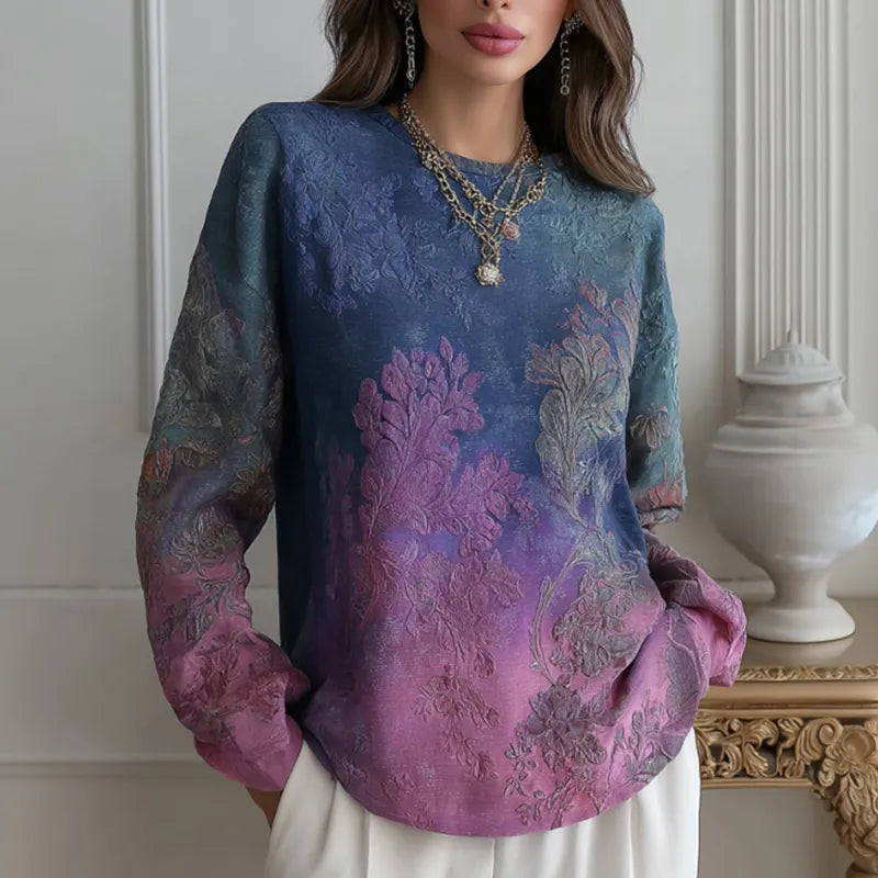 TOP CÓMODO DE CUELLO REDONDO CON BORDADO FLORAL