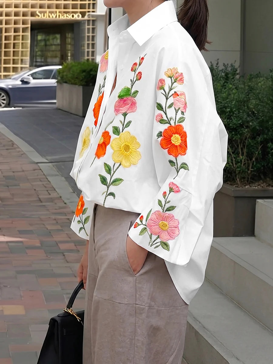 BLUSA FOLGADA DE MANGA COMPRIDA COM BOTÕES, ESTAMPADO FLORAL EM CONTRASTE E SOLAPA