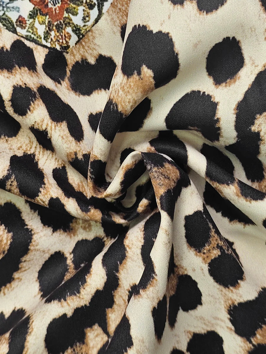 VESTIDO MAXI EM LINHA A ESTAMPADO LEOPARDO COM BOLSOS, MANGA ABALOADA E GOLA MAO
