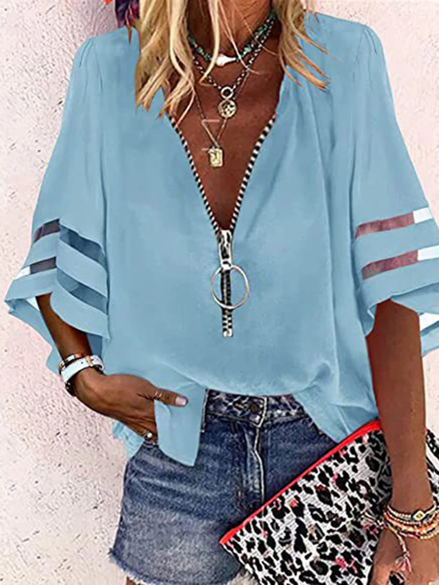 BLUSA FOLGADA DE MANGA TRÊS QUARTOS COM BAINHA, FECHO E GOLA MANDARIM