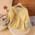 Top casual con bordado floral artístico