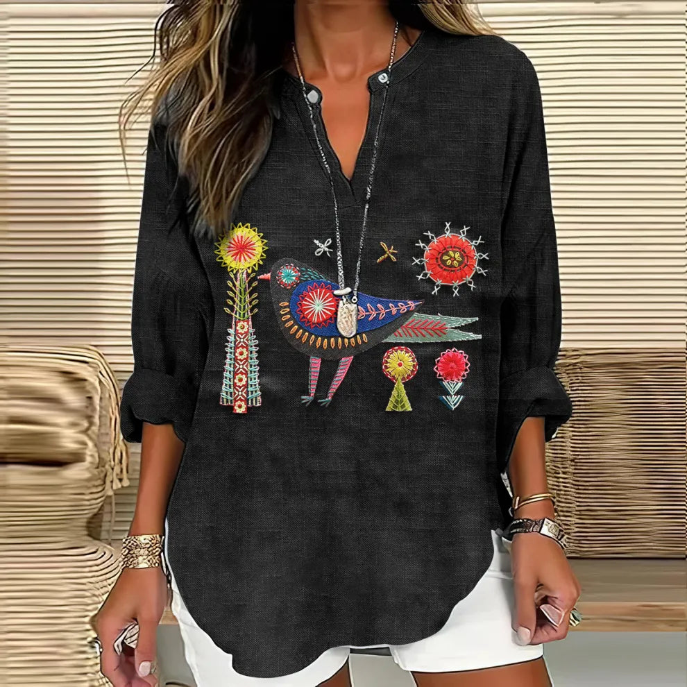 - CAMISA CUELLO V BORDADO FLORAL Y PÁJAROS