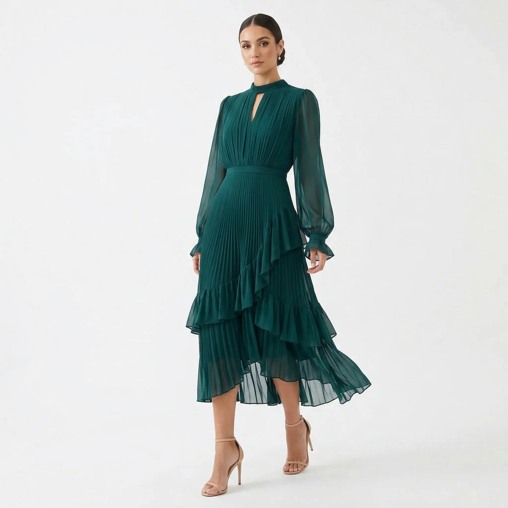 MARIANA - VESTIDO PLISADO CON MANGAS FLUIDAS y VOLANTES ASIMÉTRICOS
