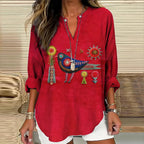 - CAMISA CUELLO V BORDADO FLORAL Y PÁJAROS