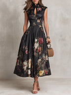 ELSA - VESTIDO MIDI PLISADO CON PATRÓN FLORAL