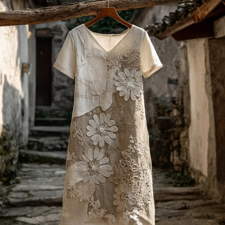 VESTIDO MIDI DE LINO CON ESCOTE EN V Y BORDADO FLORAL VINTAGE EN ENCAJE