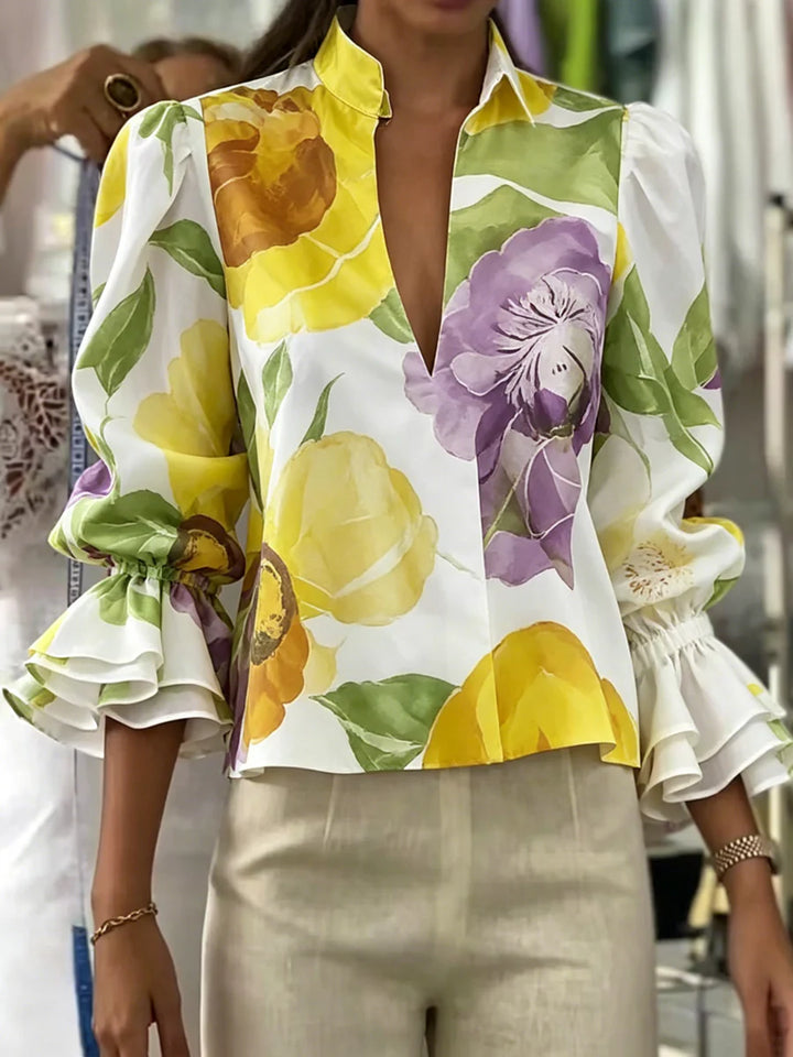 BLUSA SOLTA DE MANGA COMPRIDA EVASÊ COM ESTAMPADO FLORAL E DECOTE EM V