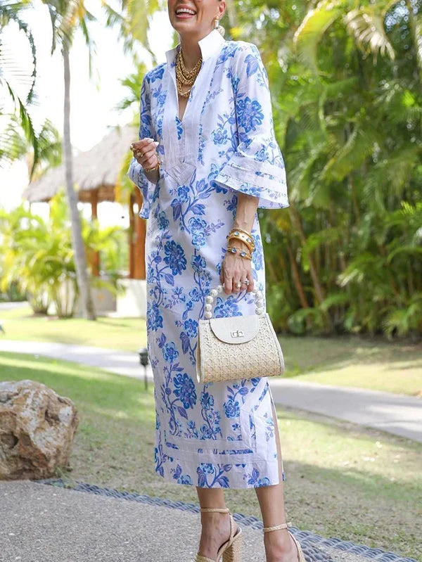 VESTIDO MIDI FLORAL FOLGADO DE MANGA COMPRIDA COM DECOTE EM V PROFUNDO E ABERTURA LATERAL