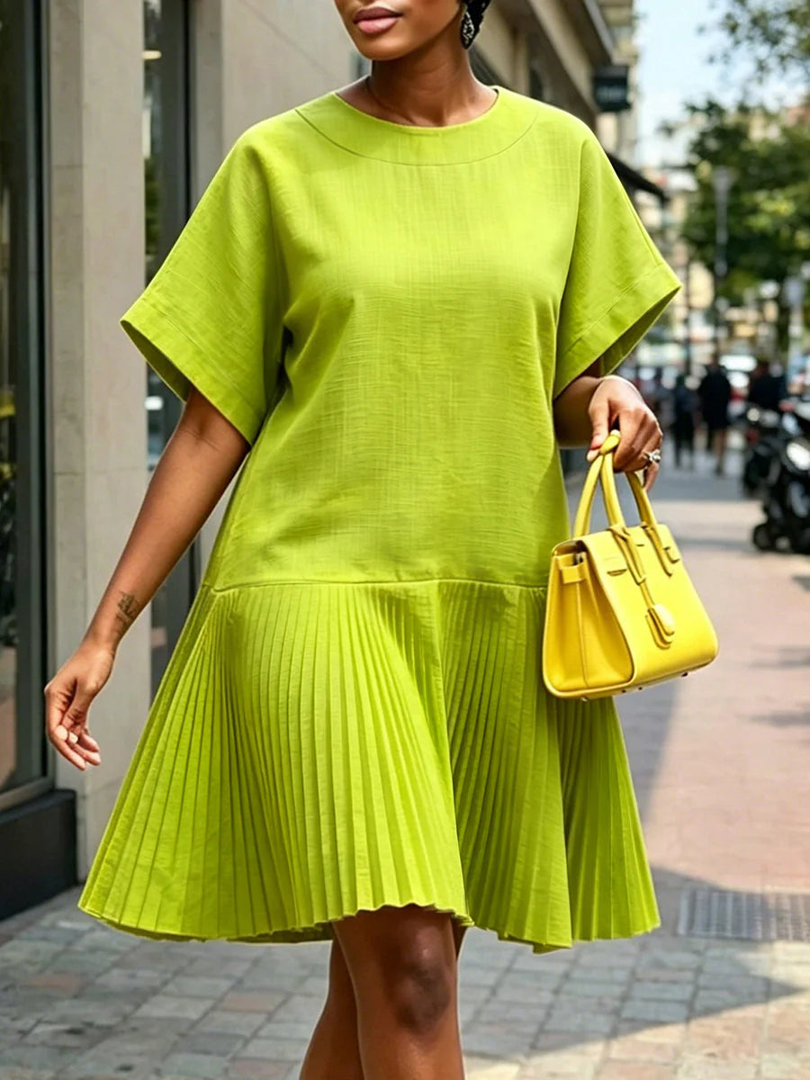 VESTIDO CURTO PLISSADO SOLTO EM ALGODÃO COM GOLA REDONDA E MANGA CURTA