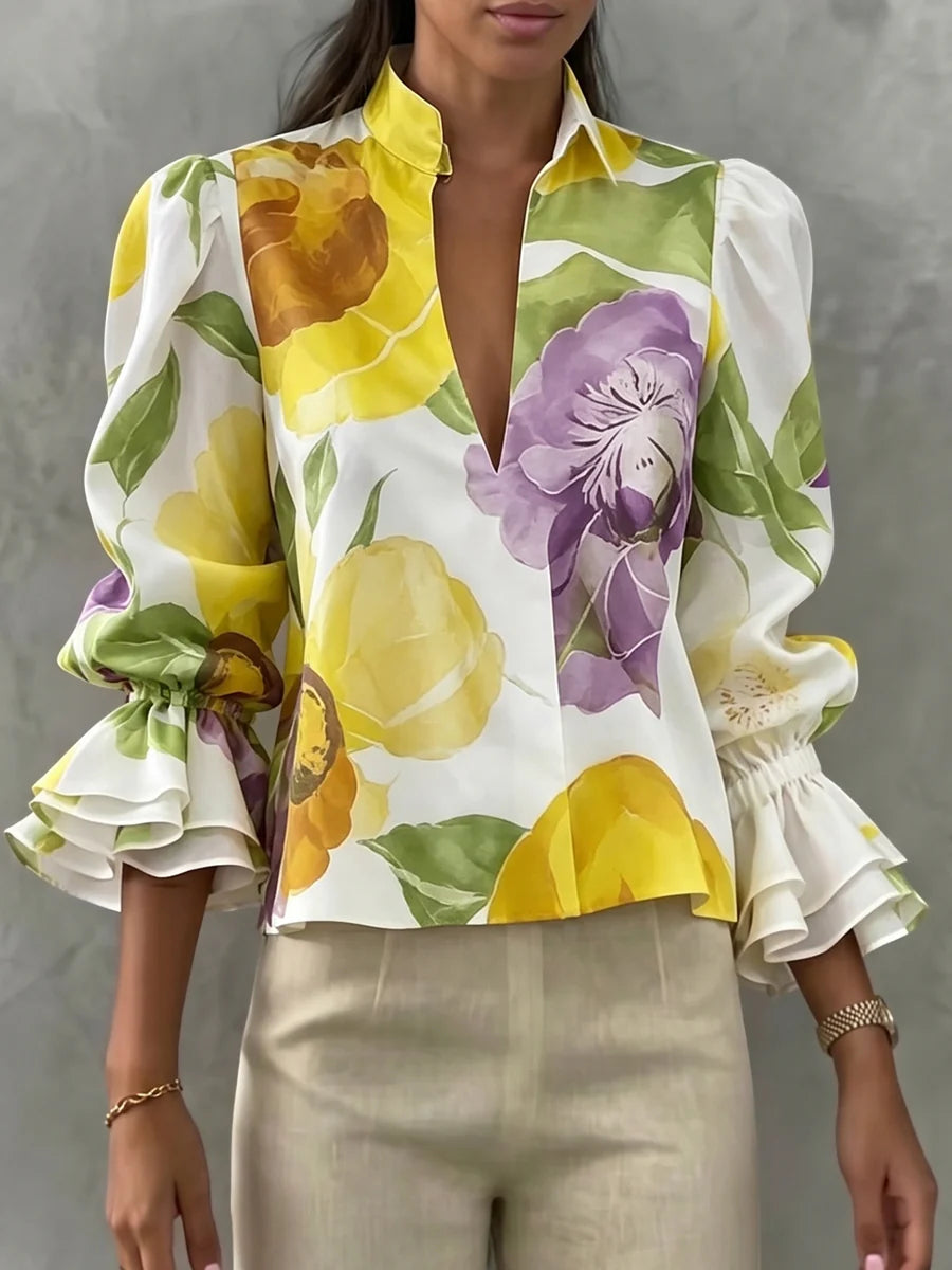 BLUSA SOLTA DE MANGA COMPRIDA EVASÊ COM ESTAMPADO FLORAL E DECOTE EM V