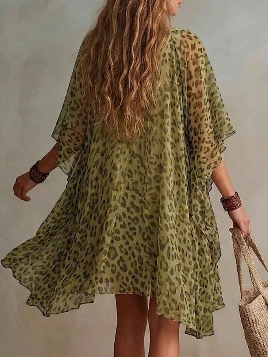Vestido corto manga murciélago leopardo asimétrico volantes escote en v transparente