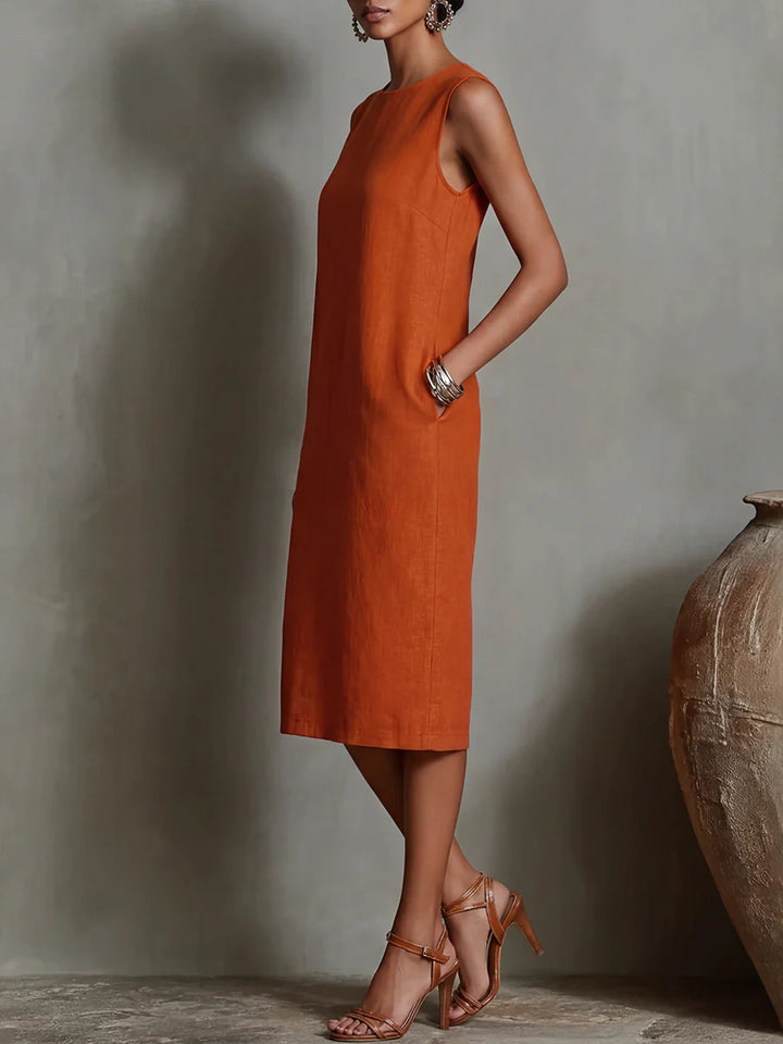 VESTIDO MIDI LARGO SEM MANGAS SOLTO COM BOLSOS E LISO - GOLA REDONDA