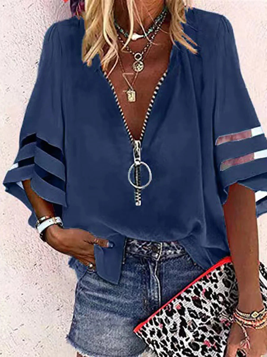 BLUSA FOLGADA DE MANGA TRÊS QUARTOS COM BAINHA, FECHO E GOLA MANDARIM