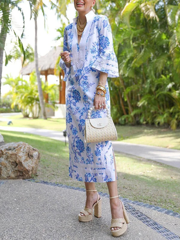 VESTIDO MIDI FLORAL FOLGADO DE MANGA COMPRIDA COM DECOTE EM V PROFUNDO E ABERTURA LATERAL