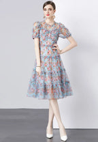 Vestido midi tul floral azul con mangas abullonadas y volantes k26062802