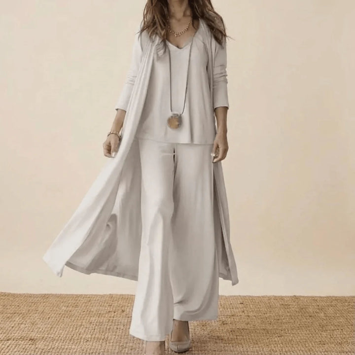 CONJUNTO DE TRÊS PEÇAS FEMININO COM CARDIGÃ COMPRIDO E CALÇAS LARGAS A COMBINAR