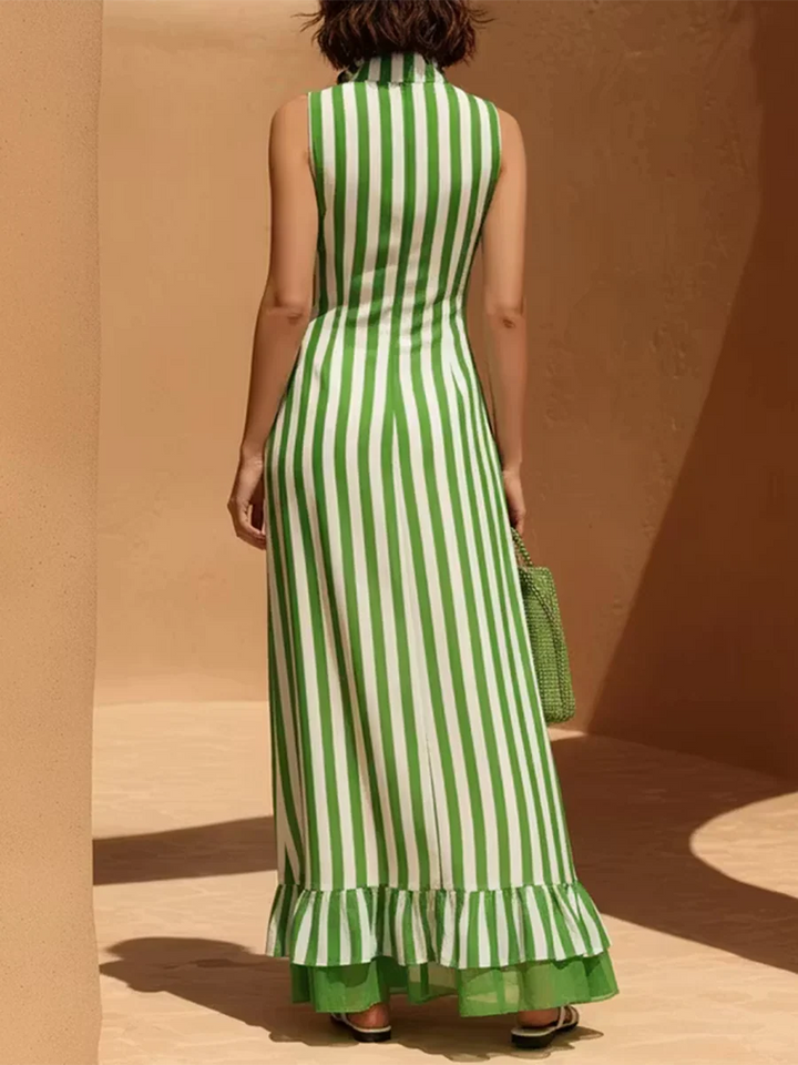 VESTIDO MAXI SOLTO SEM MANGAS COM FECHO, RISCAS, FOLHOS, BOLSOS E GOLA MAO