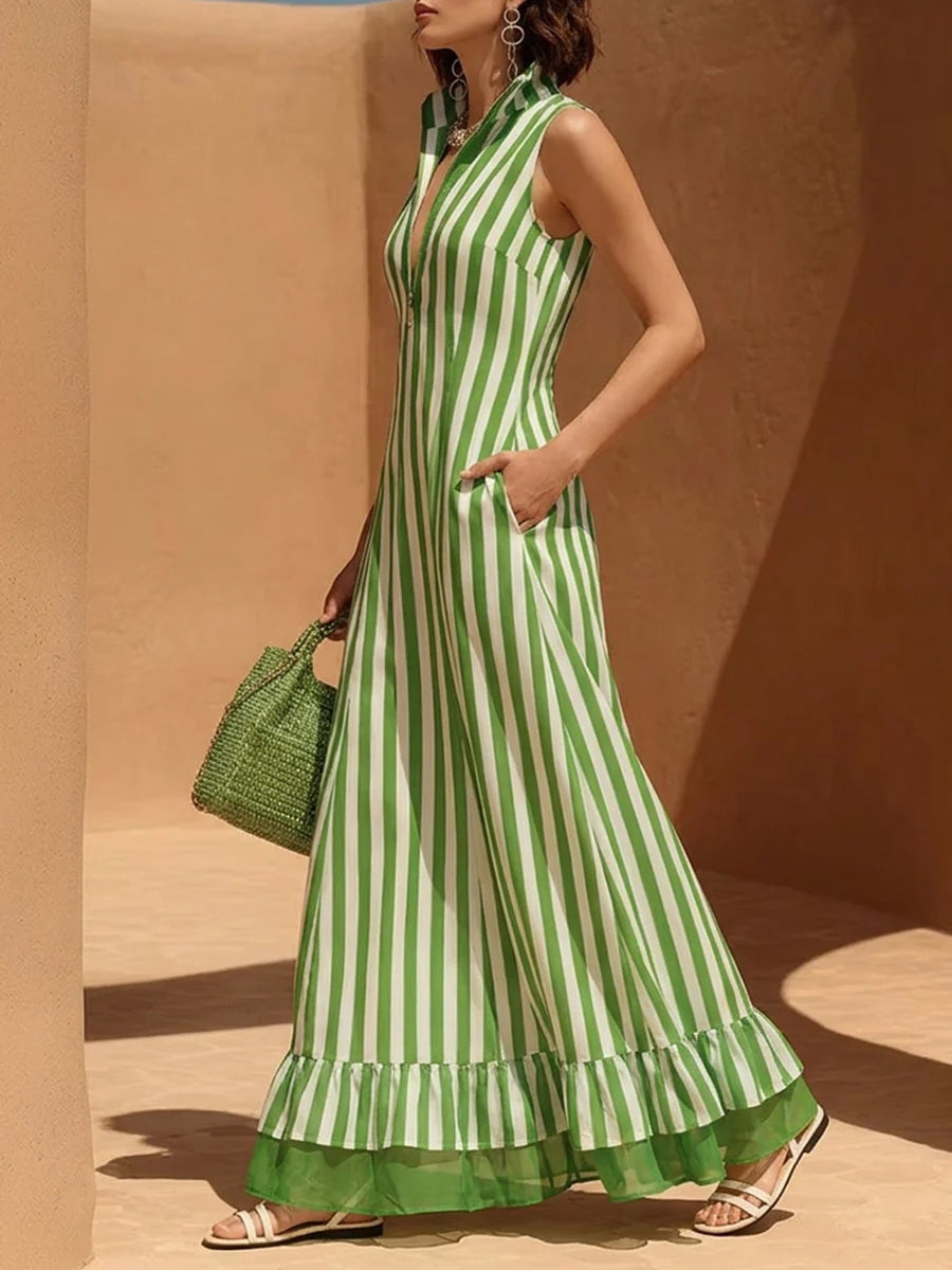 VESTIDO MAXI SOLTO SEM MANGAS COM FECHO, RISCAS, FOLHOS, BOLSOS E GOLA MAO