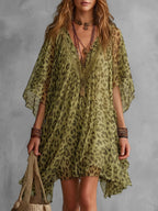 Vestido corto manga murciélago leopardo asimétrico volantes escote en v transparente